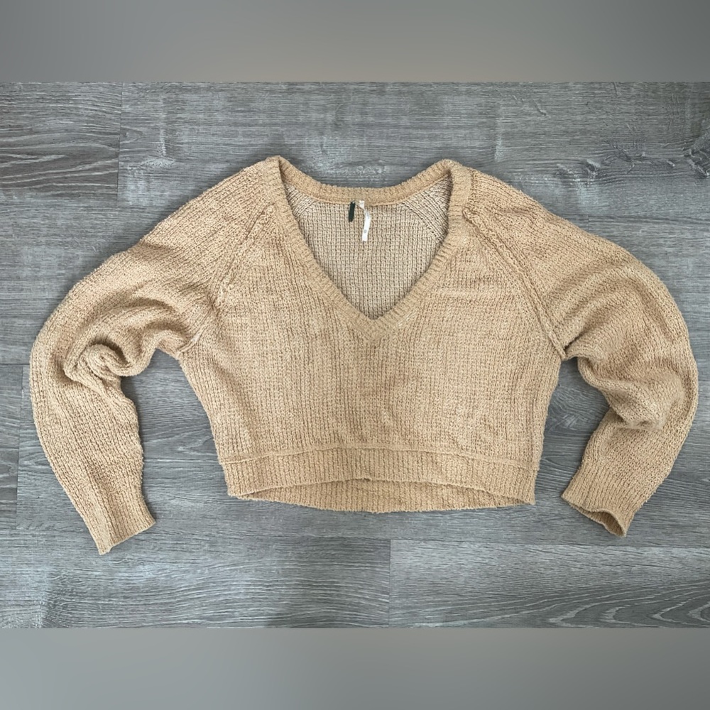 Free people, oversized, cropped sweater with V neck.